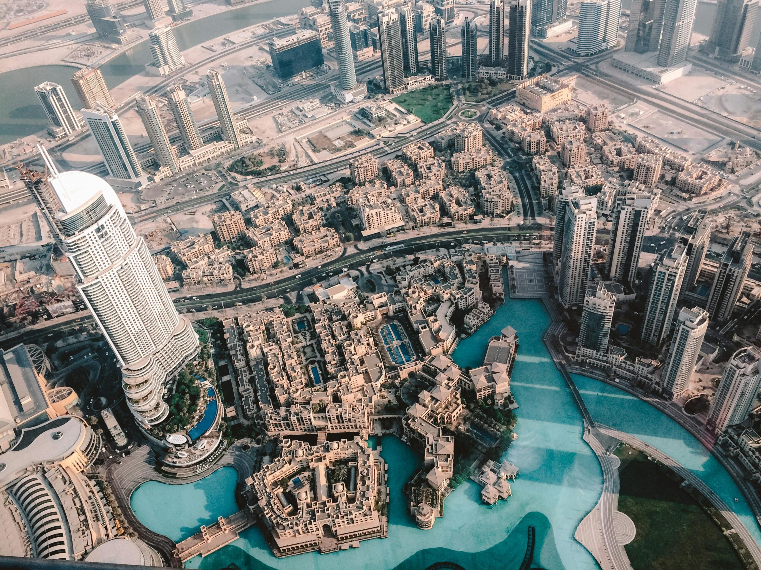 A stunning aerial view featuring the iconic skyline and architecture of Dubai, showcasing its modern urban design.